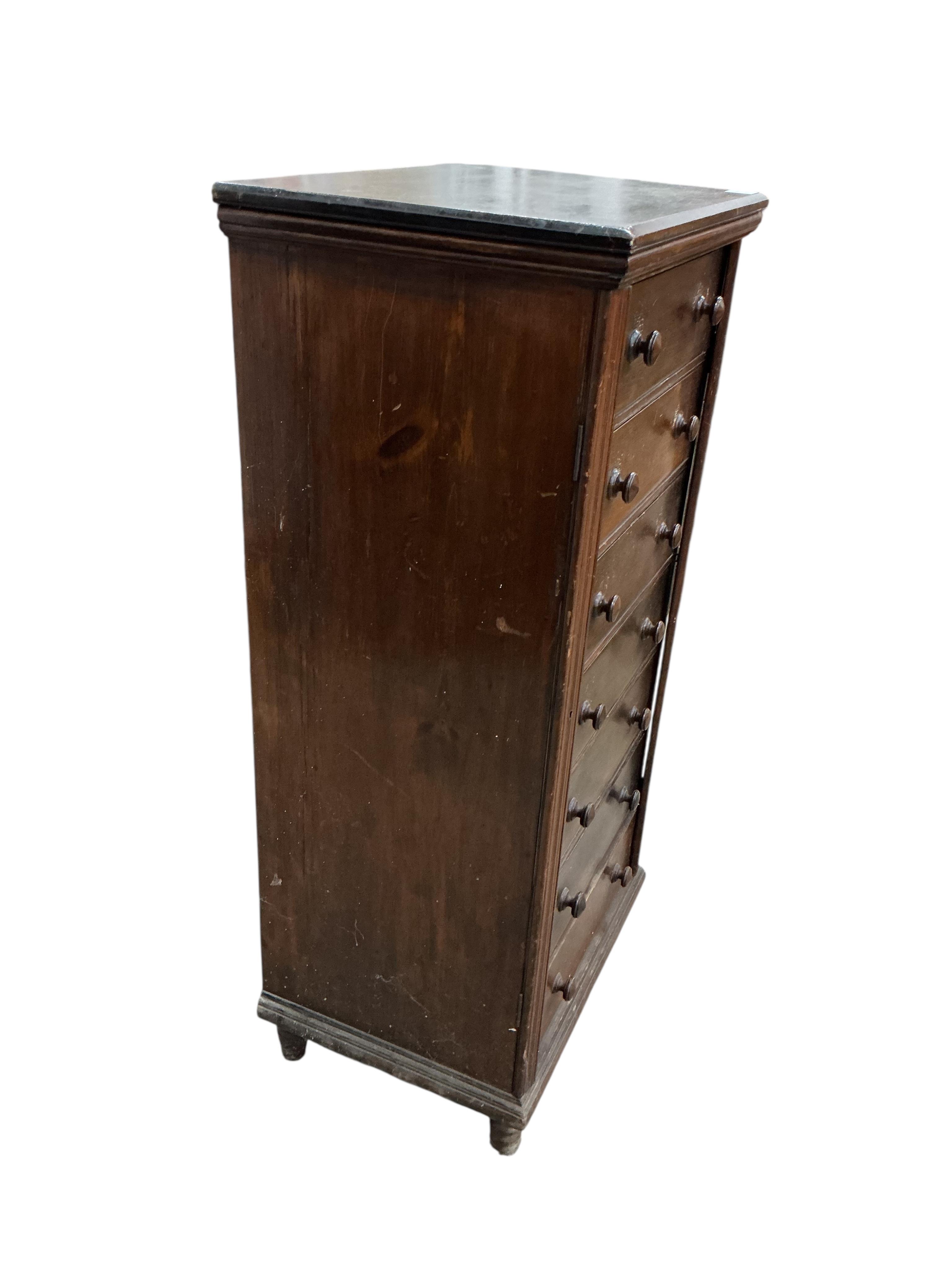 An early 20th century beech and pine Wellington chest, width 55cm, depth 41cm, height 116cm